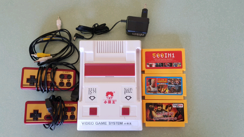 classic video game console with over 500 games and two controllers